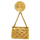 Broche Chanel Gold CC com aba medalhão