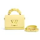 2023 Louis Vuitton Twist Handle PM Ledertasche Gelbe Tasche