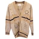 Cardigan con pompon Sandro Paris Simon Smiley in lana beige