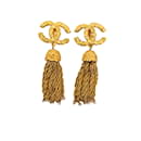 Boucles d'oreilles pendantes à franges CC dorées Chanel
