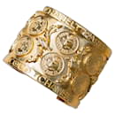 VINTAGE 1970Chanel 24K banhado a ouro metal moeda CC logotipos pulseira pulseira