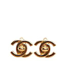 Brincos Chanel CC Turn Lock em ouro