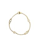 Pulsera de cadena Dior con perlas artificiales doradas