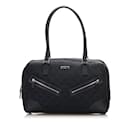 Bolso de hombro de lona Gucci GG negro