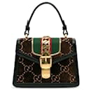 Bolso satchel Sylvie de terciopelo mini GG marrón de Gucci
