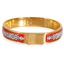Bracelet étroit Loquet en or et émail rouge Hermès Vintage