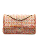 Bolsa de ombro Chanel média trançada clássica com lantejoulas e aba de tweed rosa