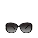 Schwarze, runde, getönte Gucci-Sonnenbrille