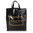 Gucci Montecarlo Tote aus beschichtetem Canvas in Schwarz und Gold