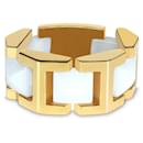 Versace Flexibler Ring mit weißen Keramikpyramiden in 18K Gelbgold