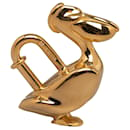Hermes Gold Pelican Cadena Lock Charm - Hermès