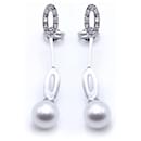 Long earrings in white gold and pearls. - Autre Marque