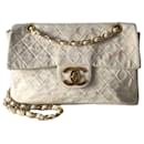 Chanel Timeless Maxi Jumbo bag in quilted ecru canvas