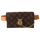 Louis Vuitton S Lock clutch in monogram canvas and natural leather