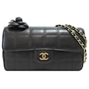 Rabat de barre choco en cuir d'agneau camélia noir Chanel