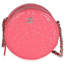 Mini pochette rotonda Chanel in caviale goffrato rosa camelia con catena