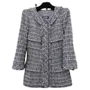9K$ Tweed-Jacke mit metallischem Kettenbesatz - Chanel