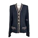 Zeitlose Jacke aus schwarzem Tweed mit CC-Knöpfen - Chanel