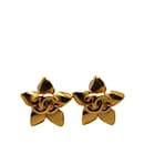 Boucles d'oreilles clip Chanel CC Star Boucles d'oreilles en métal en bon état