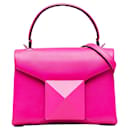 Bolso satchel mini con tachuelas en rosa de Valentino