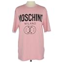 Camiseta rosa con logo estampado de Moschino