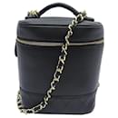 SAC A MAIN CHANEL VANITY EN CUIR NOIR CHAINE BANDOULIERE TOILETRY POUCH HAND BAG - Chanel