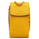 Bolso bandolera para teléfono Chanel CC Caviar amarillo