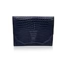 Bolso clutch con solapa en relieve de cuero negro vintage - Yves Saint Laurent
