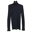 Suéter de cuello alto de cachemir negro Chanel Sz.38