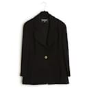Conjunto de casaco preto de lã clássico Chanel dos finais dos anos 80 tamanho FR40 US10.