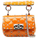 Bolso satchel Rockstud Spike de microcharol naranja Valentino