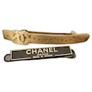 Barra de cabello Chanel con estrellas CC.