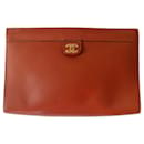 Vintage Chanel lamb leather clutch sold with its box