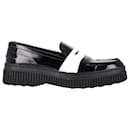 Tod's Platform Penny Loafers in Black Leather