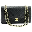 Schwarze Farbe 1989 Mittelgroße klassische gefütterte Überschlagtasche - Chanel