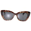 Gafas de sol estilo ojo de gato en marrón Zucca de Fendi