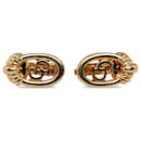 Boucles d'oreilles clip logo doré Dior