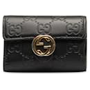 Porta-chaves de assinatura Gucci Black Guccissima Icon