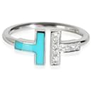 TIFFANY Y COMPAÑIA. Anillo Tiffany T azul y diamantes en 18K oro blanco 0.07 por cierto - Tiffany & Co