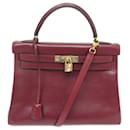 Hermès Kelly Handtasche 32 Zurückgegeben in ziegelroter Box-Handtasche aus Leder zum Umhängen