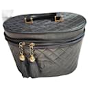 Large black leather Chanel vanity case. Used, good condition. Spacious. Condition 5/10.