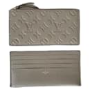 Louis Vuitton Flache Tasche und Reißverschlusstasche