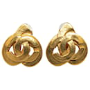 Boucles d'oreilles à clip coeur CC dorées Chanel