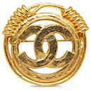Broche Chanel CC de oro