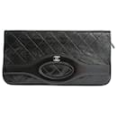 Chanel Clutch handbag in matelassé black leather