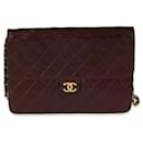 Bolso Chanel Vintage de piel de cordero acolchada color borgoña con una sola solapa