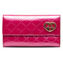 Portefeuille long rose Gucci Guccissima Lovely Heart