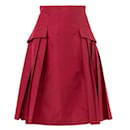 Falda roja con bolsillo acampanado de Prada