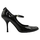 Zapatos de tacón Mary Jane de charol negro de Gucci