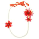 Lanvin – Orangefarbene Halskette mit Kunstperlen und Plastikblumen